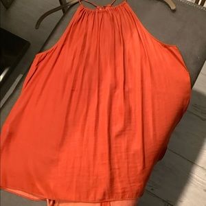 Loft rust.  High halter neck. Back button keyhole